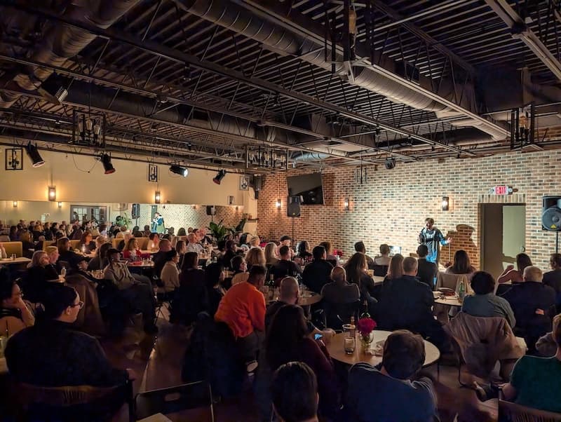 Packed comedy show audience