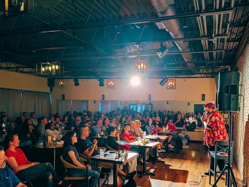 Comedian performing on stage